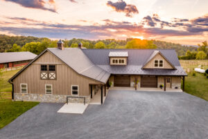 default horse barn with tan siding and stone veneers