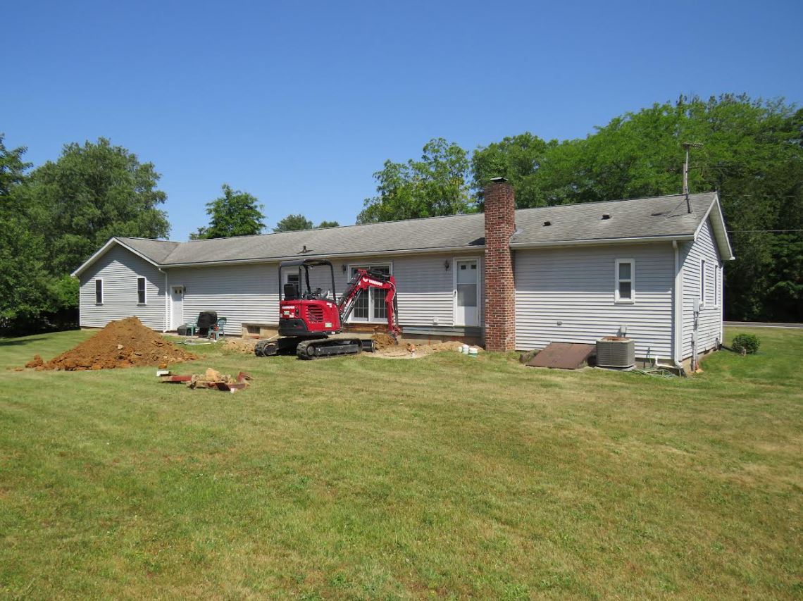 digging and adding the foundation for a home addition