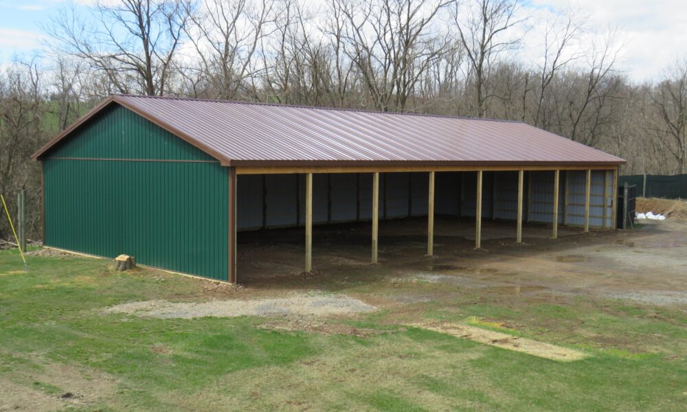 40x80x12 green and brown pole barn