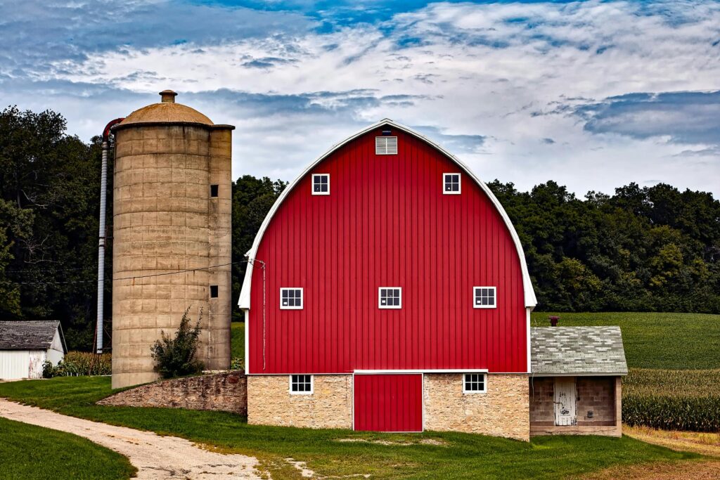red gambrel barn on a farm